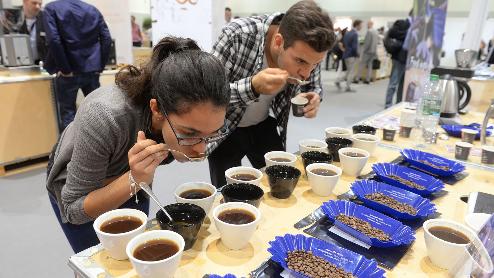 Two visitors to the COTECA Coffee, Tea and Cocoa Global Industry Expo in the Hamburg exhibition halls